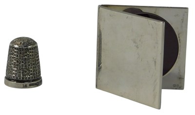 Lot 425 - An Elizabeth II miniature silver folding...