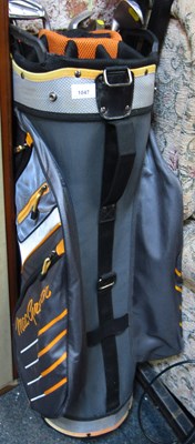 Lot 1047 - A MacGregor golf bag containing five golf...