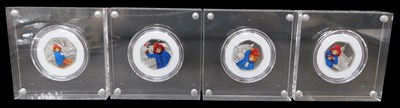 Lot 444 - Four The Royal Mint Paddington fifty pence...