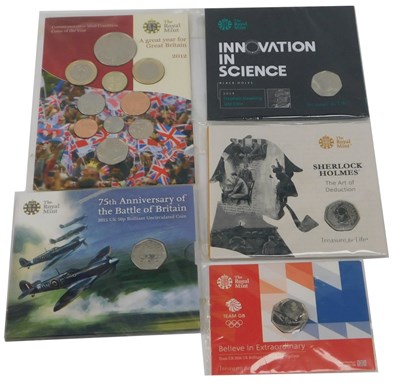 Lot 454 - A group of commemorative coins and coin sets,...