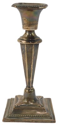 Lot 413 - A George V silver candlestick, with beaded...