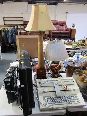 Lot 2042 - An electronic typewriter, model SE400, two...