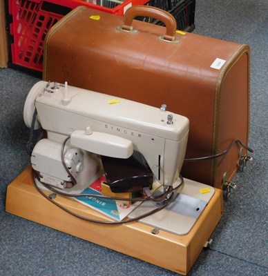 Lot 2084 - A Singer portable electric sewing machine....