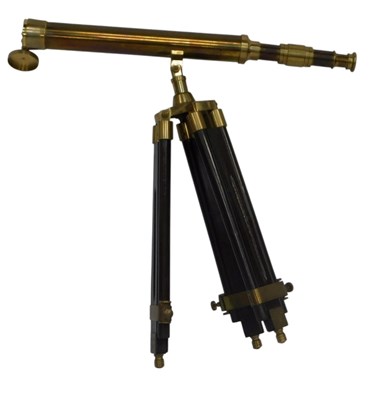 Lot 270 - A 20thC brass telescope, 62cm long, on a...
