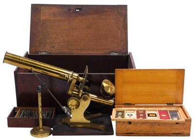 Lot 741 - A late 19thC brass microscope, mahogany cased,...