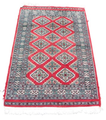Lot 758 - A Bokhara red ground rug, the central field...