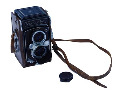 Lot 498 - A Yashica-Mat twin reflex camera, in a partial...
