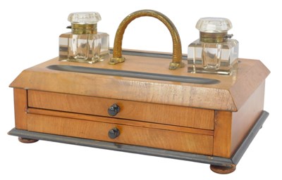 Lot 502 - An early 20thC oak desk stand, the top with...