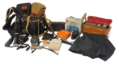 Lot 334 - A group of cameras and optical related...