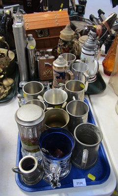 Lot 2124 - A group of hip flasks, together with steins,...
