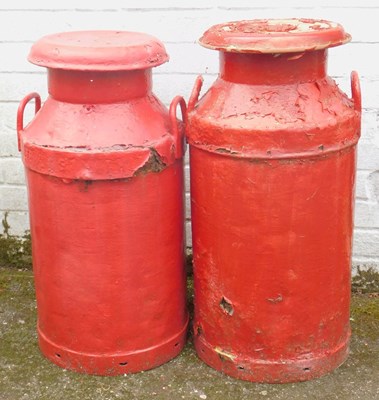 Lot 552 - A pair of red painted galvanised metal milk...