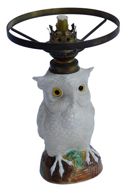Lot 526 - An Ernst Bohne and Sohne porcelain oil lamp...