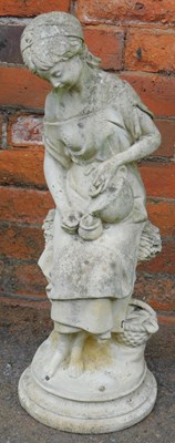 Lot 562 - A composition stone garden figure, modelled as...
