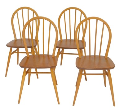 Lot 581 - A set of four Ercol model 400 beech and elm...