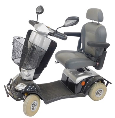 Lot 586 - A CMX mobility scooter, in silver and black...