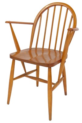 Lot 591 - A 20thC elm and beech loop back carver chair,...