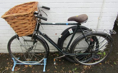 Lot 1121 - A vintage gent's bike, with basket front, and...