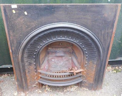 Lot 1121 - A cast iron fireplace.