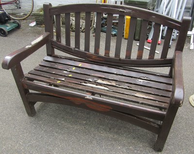 Lot 1125 - A two seater garden bench. (AF)