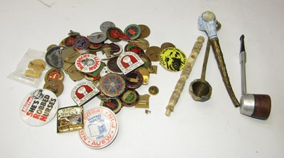 Lot 2208 - A small group of pipes and badges. (contents...