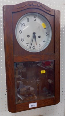 Lot 2212 - A wall clock, with Arabic numerals to dial,...