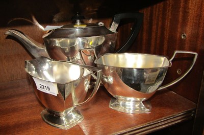 Lot 2219 - A silver-plated teapot, milk jug and sugar bowl.