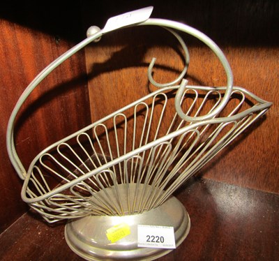 Lot 2220 - A white metal wine basket.