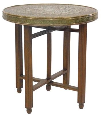 Lot 620 - A 20thC Indian brass top table, the circular...