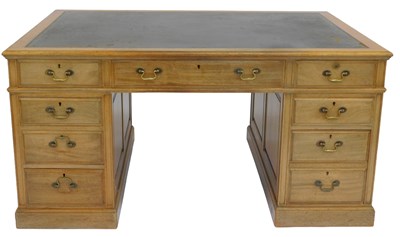 Lot 621 - An early 20thC mahogany partner's desk, the...