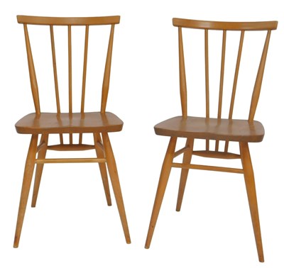 Lot 654 - Two Ercol elm and beech dining chairs, model...