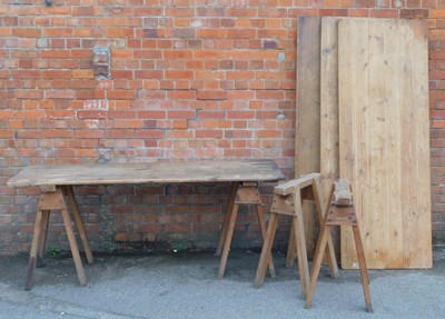 Lot 567 - Four pine trestle table tops, together with...