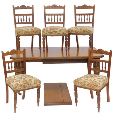 Lot 674 - A Victorian oak extending dining table, the...
