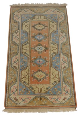Lot 698 - A Turkish cream and pink ground rug, with a...