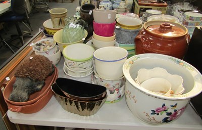 Lot 2254 - Ceramic planters, one in the form of a large...