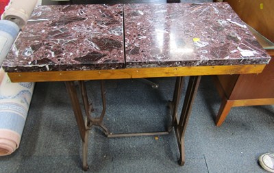 Lot 1130 - A vintage sewing machine base table, with a...