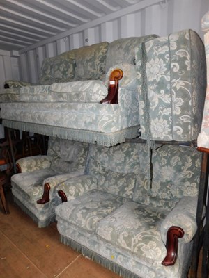 Lot 1075 - A three-piece suite, comprising a three seater...