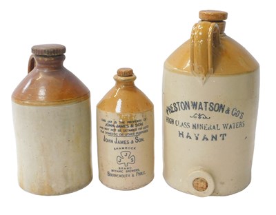 Lot 702 - Three stoneware flagons, for Preston, Watson &...