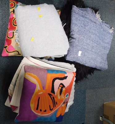 Lot 2151A - A group of mixed sheepskin, woollen blankets,...