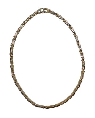 Lot 376B - An X frame necklace, with half brushed...