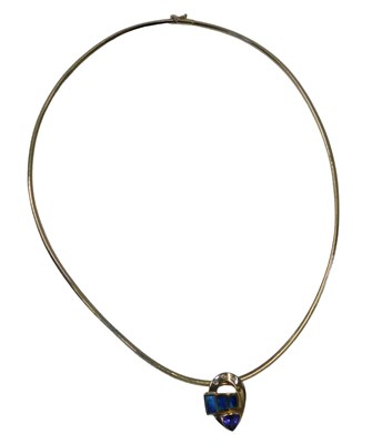 Lot 10B - A tanzanite fire opal and diamond pendant and...