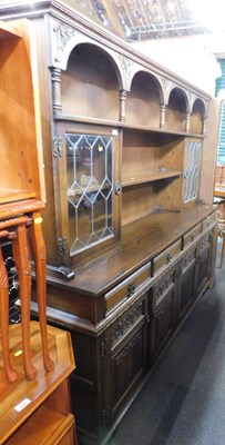 Lot 1146 - An Old Charm oak finished dresser, with...
