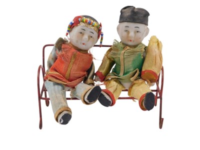 Lot 298 - A pair of Japanese bisque porcelain miniature...