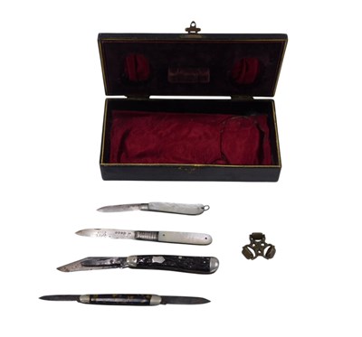Lot 300 - A miniature leather travel case, and selection...