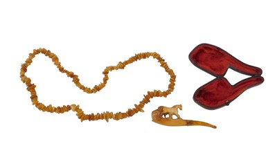 Lot 302 - A late 19thC Meerschaum pipe, with amber...