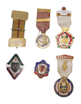 Lot 312 - A group of medals and badges, comprising a St...