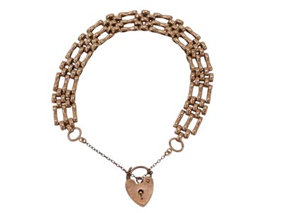 Lot 112 - A 9ct rose gold gate bracelet, of three bar...