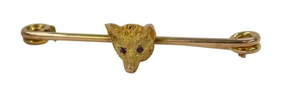 Lot 119 - A fox head brooch, the fox's head set with two...