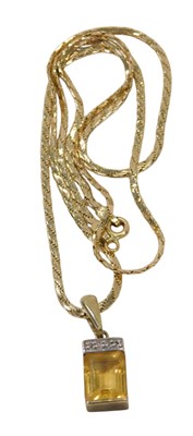 Lot 120 - A 9ct gold citrine and diamond pendant and...