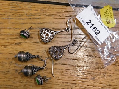 Lot 2162 - Three pairs of white metal earrings,...