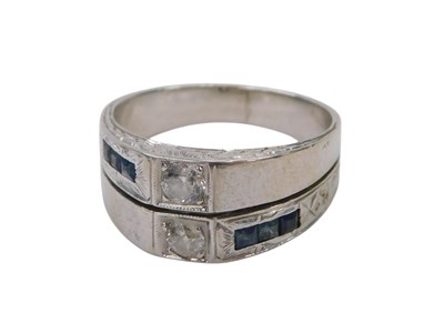 Lot 238 - A sapphire and diamond dress ring, of two row...